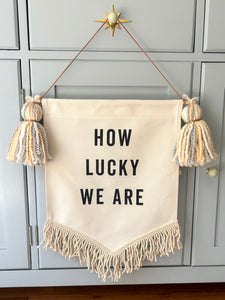 'How Lucky We Are' Banner